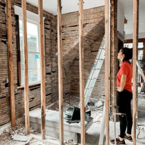 woman looking at unexpected renovation issues