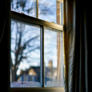 image of a window with ice forming on it