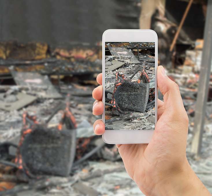 taking photo of fire damage