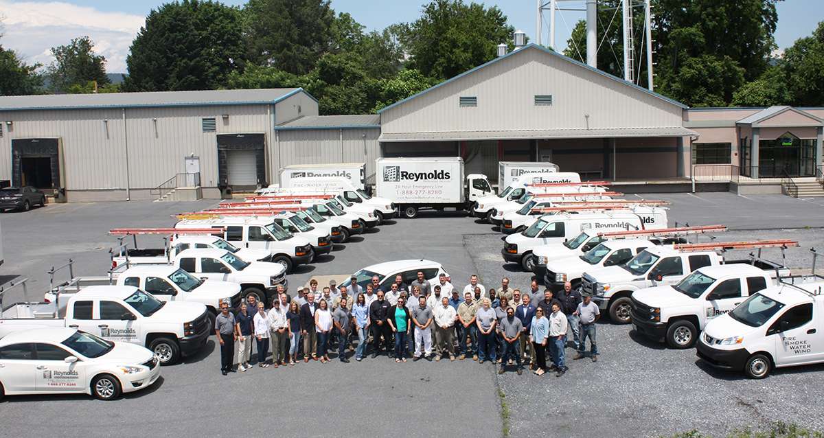 group of employees at reynolds restoration services